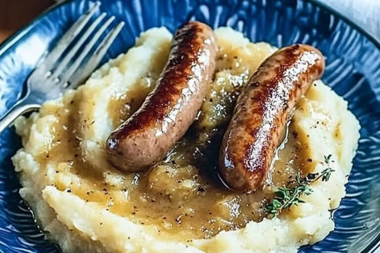 Salchichas con puré y salsa